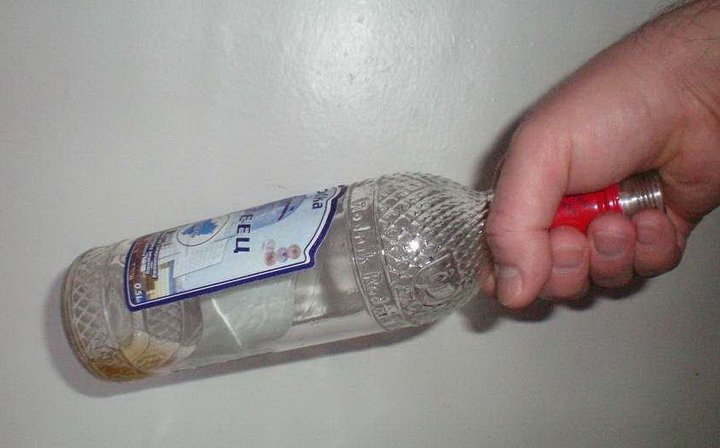 Киянка до смерті забила свого співмешканця пляшкою з-під горілки