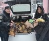 Вінницькі патрульні з працівниками служби таксі передали дітям подарунки від Святого Миколая
