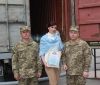 Депутатка облради передала воду військовослужбовцям