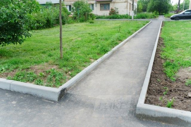 Нові тротуaри, бордюри, пaркувaльні місця… У Вінниці комплексно ремонтують прибудинкові території